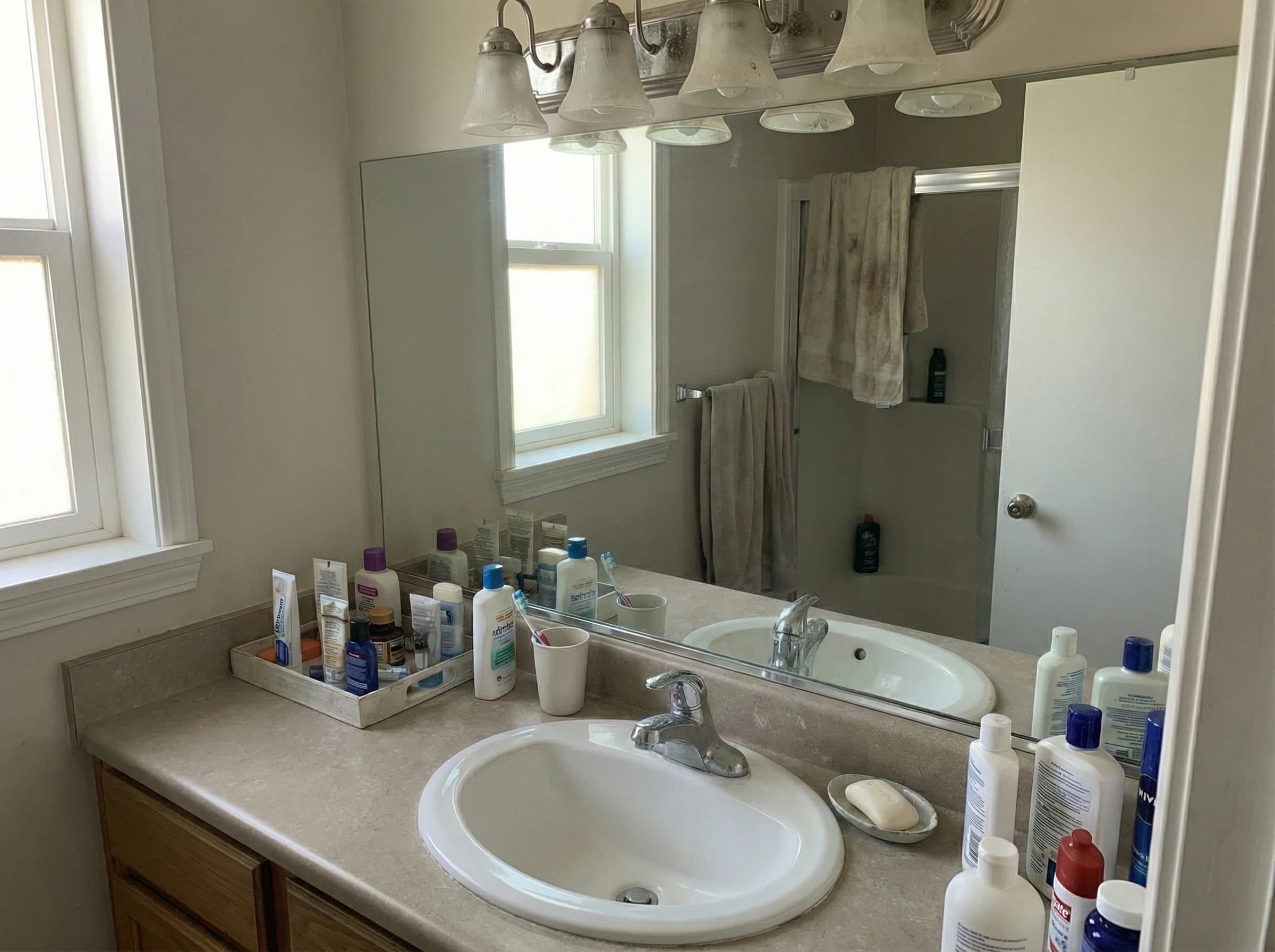 Spotless bathroom vanity and mirror after professional pre-listing deep cleaning in South Surrey
