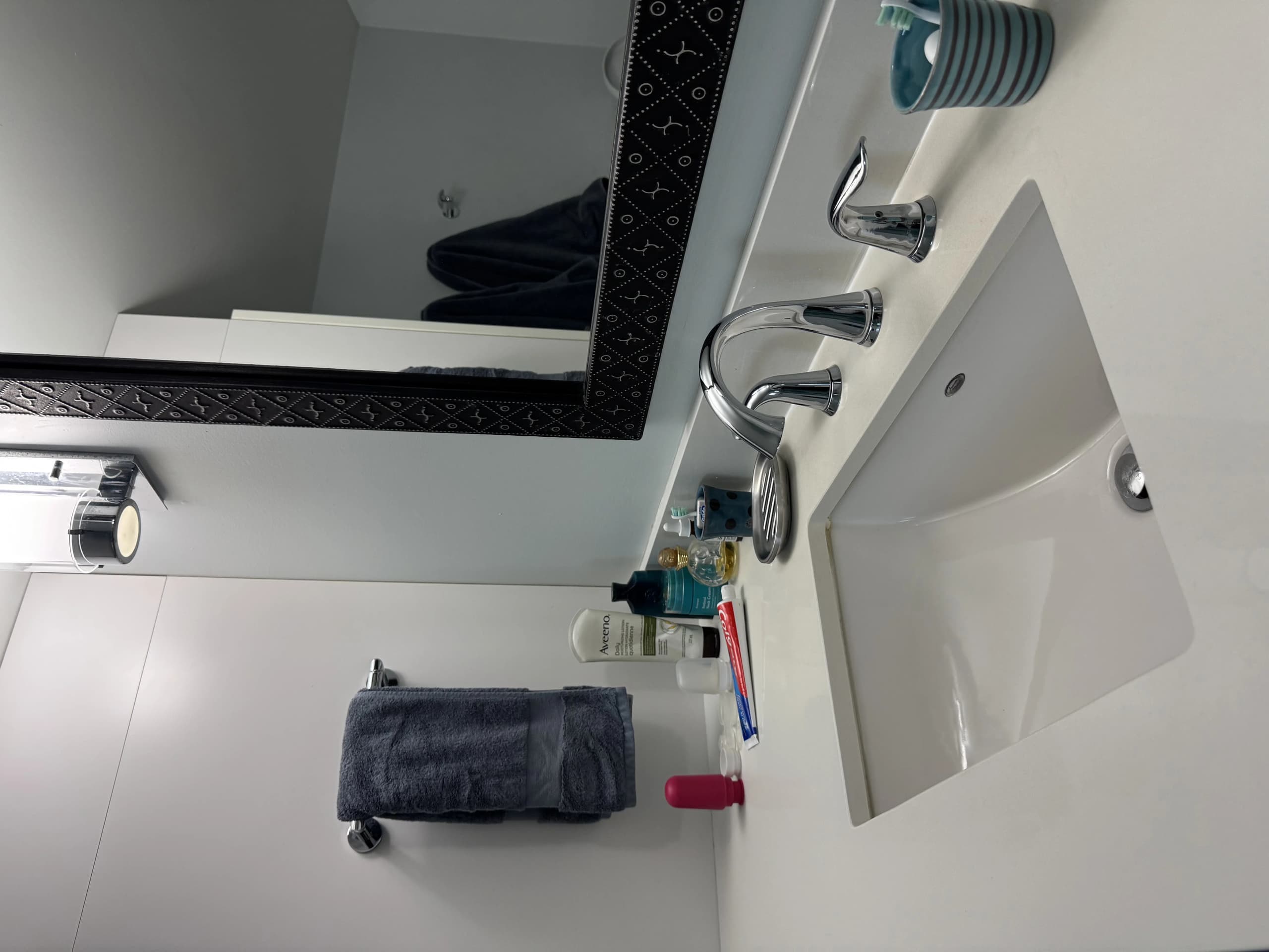 Spotless bathroom vanity with polished fixtures in West Vancouver luxury home