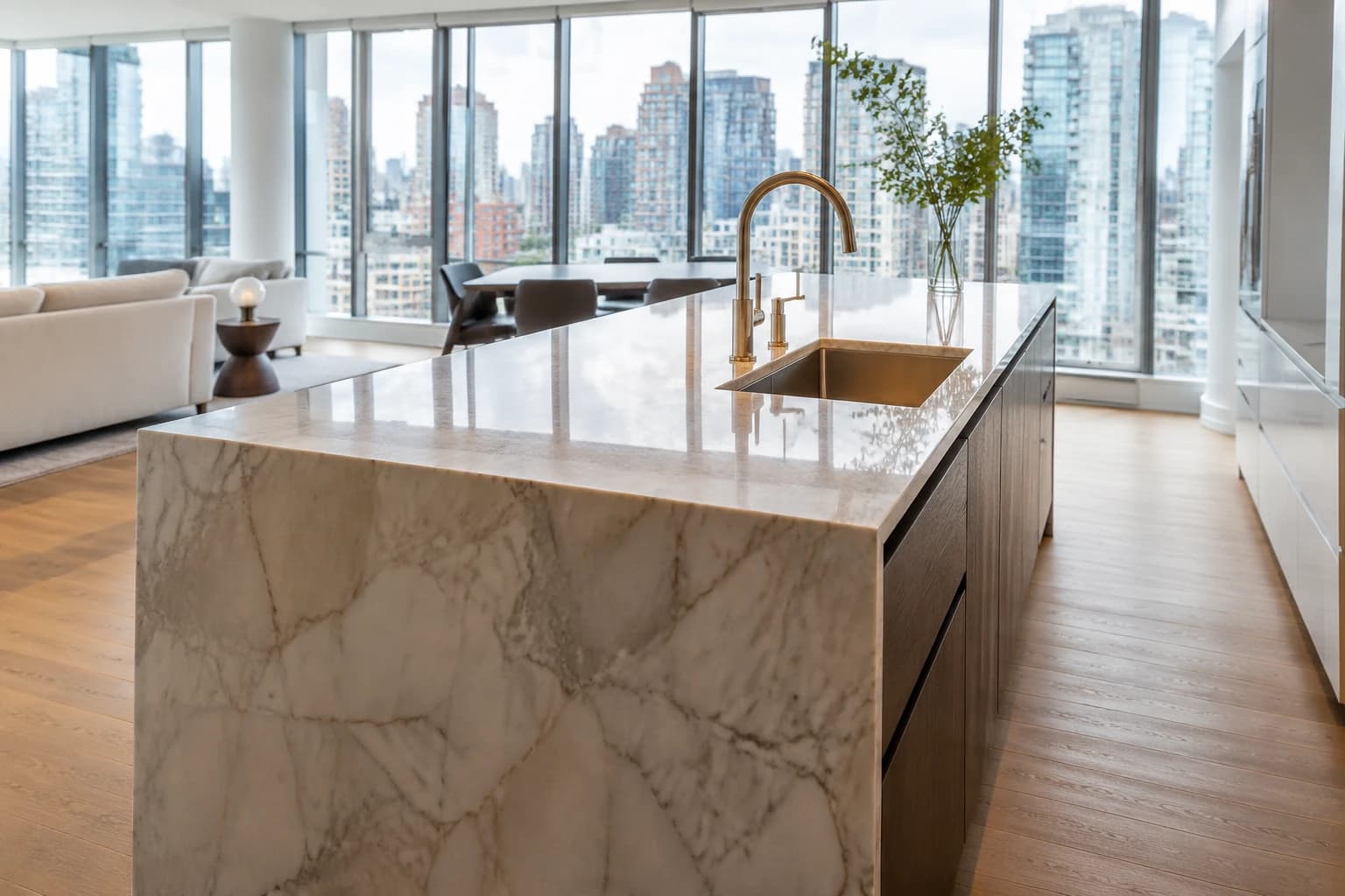 Polished marble kitchen island in a downtown Vancouver condo cleaned to a reflective finish