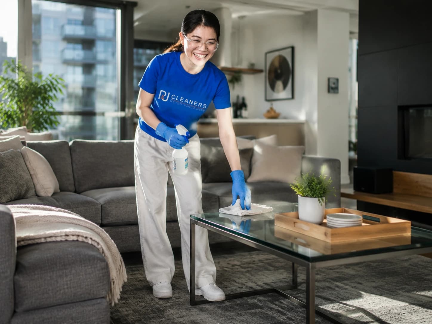 Professional cleaner with cleaning supplies ready for work